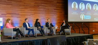 Panelists speaking at the 10th Annual Access to Innovation Conference.