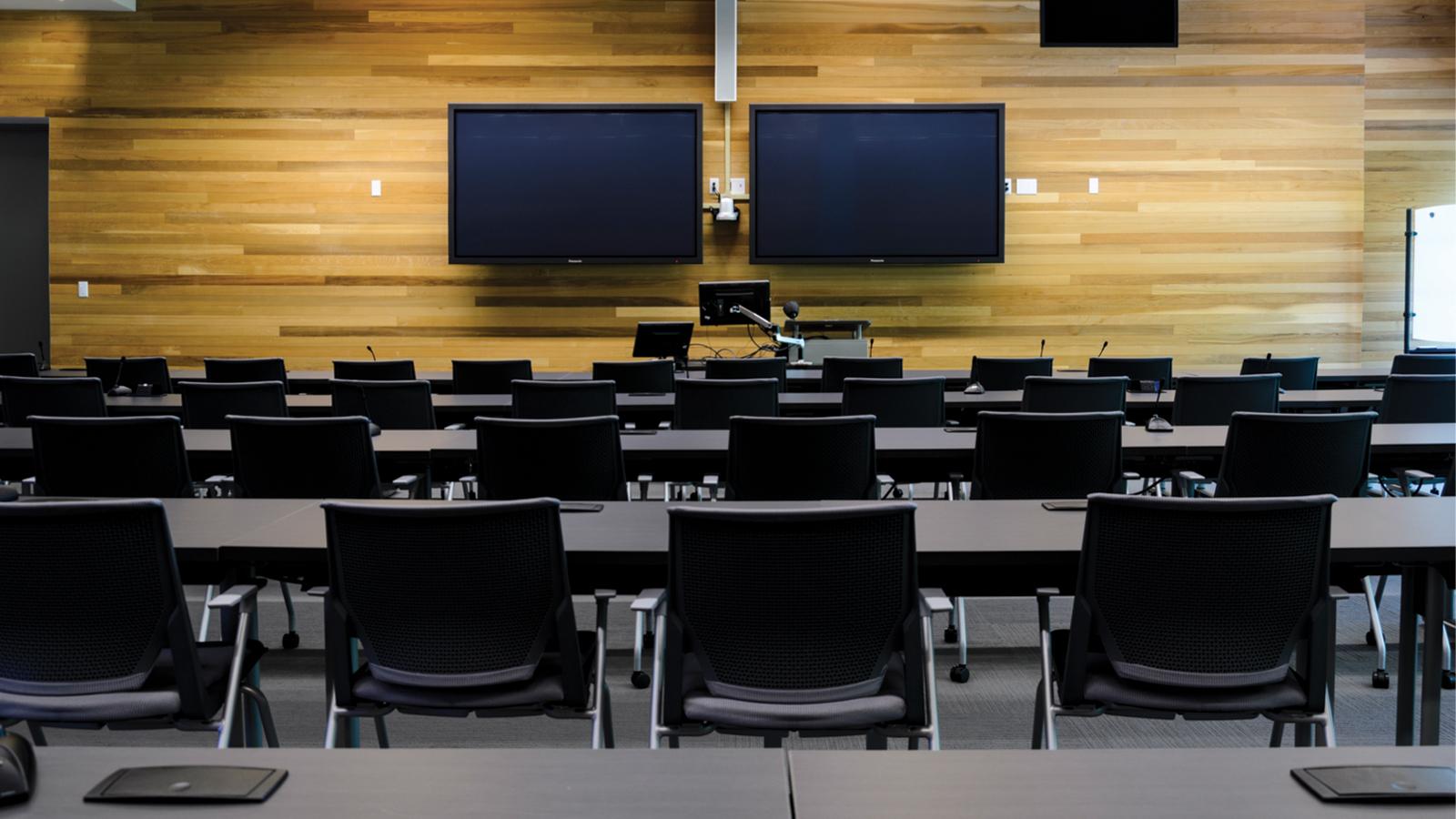 An empty classroom in the Pharmaceutical Sciences Building.