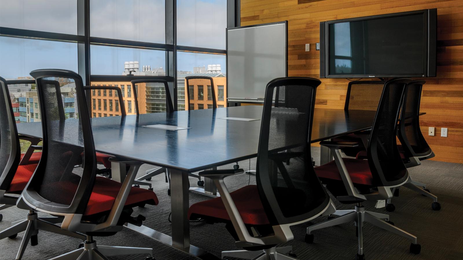 An empty meeting room in the Pharmaceutical Sciences Building.